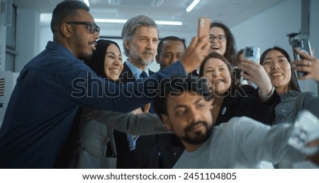 Multiethnic people come to mature presidential candidate after voting. US citizens talk and take selfies with American politician at polling station. National Election Day in United States of America.