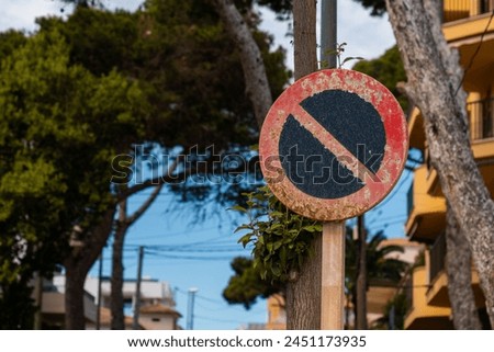 old rusty no parking traffic sign in Mallorca Spain