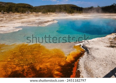 Spectacular Sapphire Pool in Biscuit Basin in Upper Geyser Basin, Yellowstone National Park Wyoming Royalty-Free Stock Photo #2451182797