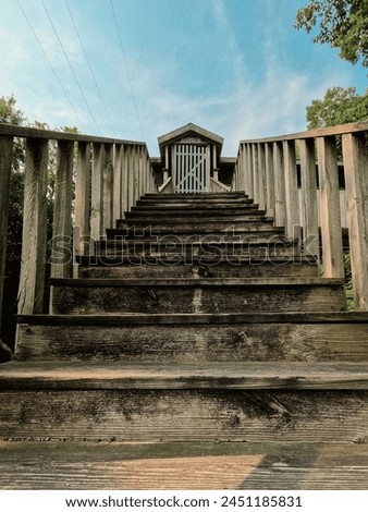 Looking up the steps to a restored version of an old saw and grist mill on the river. Located on the Sangamon River in Petersburg, Illinois, close to Lincoln's New Salem State Historic Site. 