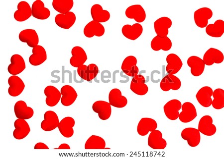 Red hearts scattered on white background 