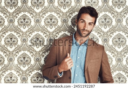 Portrait, confident and businessman and elegant for fashion by wallpaper with smart, formal and sustainable clothing. Professional, male person and creative design with style trends by pattern