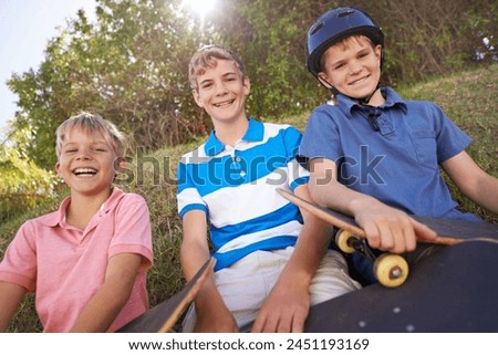 Friends, children and skateboard in outdoor portrait, brothers and smiling for sports. Happy siblings, laughing and humor on adventure, bonding and funny joke or playing on vacation or holiday Royalty-Free Stock Photo #2451193169