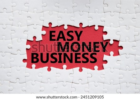 Easy Money Business symbol. Concept words Easy Money Business on white puzzle. Beautiful red background. Business and Easy Money Business concept. Copy space.