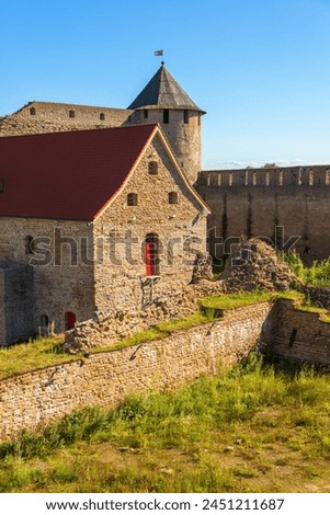 Ivangorod fortress in Ivangorod, Leningrad Oblast, Russia. Located on the Narva River along the Russian border with Estonia Royalty-Free Stock Photo #2451211687