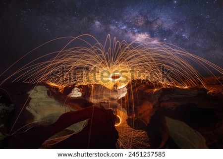 Milky way at Sam Phan Bok ready Burning steel wool fireworks, beautilul stone mountain and a beautiful reflection of the water the grand canyon of Thailand (3000 bok)  Mekong River, Ubon Ratchathani, 