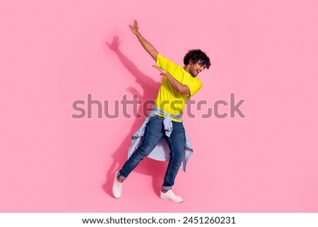 Photo of funny cheerful nice man wear stylish yellow clothes modern dance isolated on pink color background