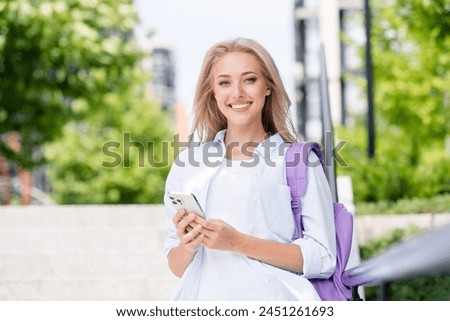 Photo of pretty cute positive woman walking in green spring park enjoying weekend time summer outdoors
