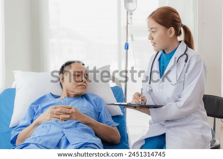 Young Asian female doctor talking with elderly man Provide care and assistance to patients in hospital beds Elderly health care and medicine