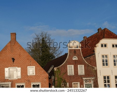 the village of Greetsiel at the north sea in germany Royalty-Free Stock Photo #2451332267
