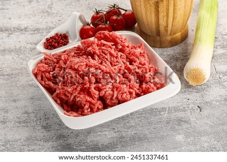 Minced beef meat in the bowl for cooking