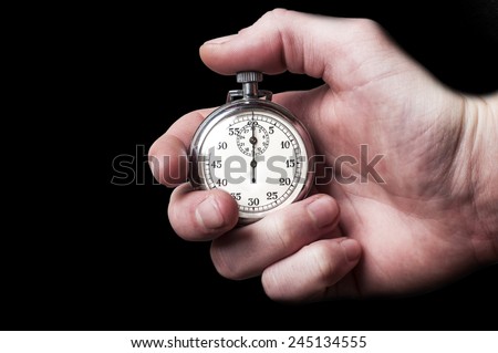 Stopwatch on black background Royalty-Free Stock Photo #245134555
