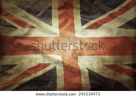 Closeup of grunge Union Jack flag  Royalty-Free Stock Photo #245134975