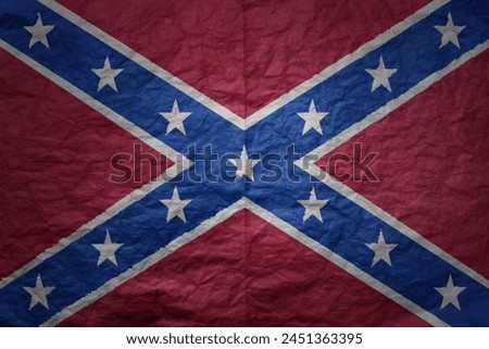 colorful big national confederate flag on a grunge old paper texture background