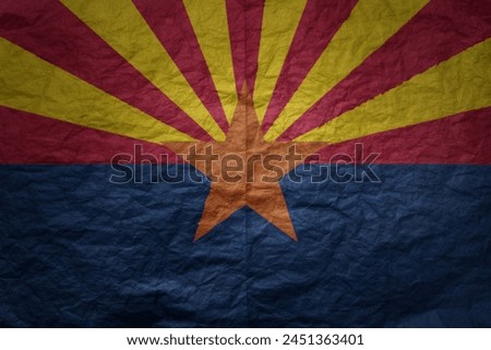 colorful big national flag of arizona state on a grunge old paper texture background