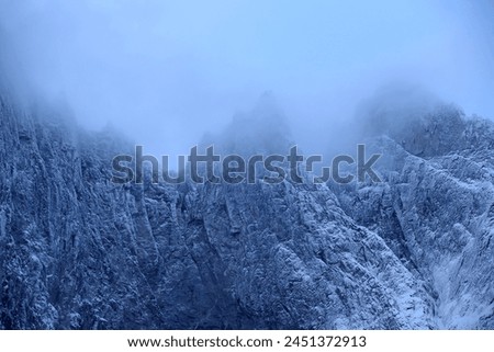 Trollveggen mountains in winter (Norway). Royalty-Free Stock Photo #2451372913