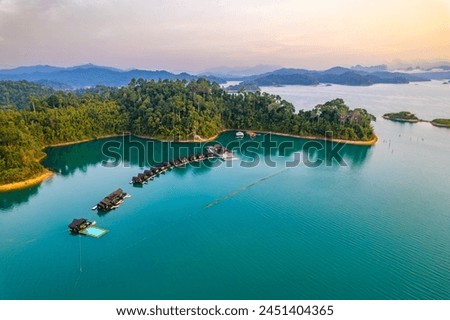 Aerial view of Khao Sok national park at sunrise, in Cheow lan lake, Surat Thani, Thailand Royalty-Free Stock Photo #2451404365