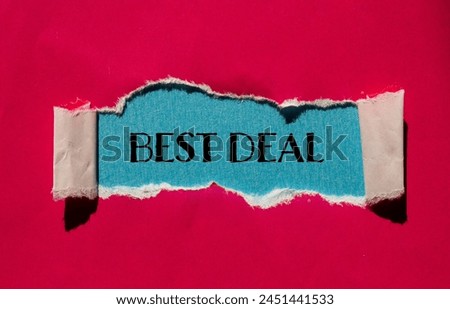 Best deal words written on ripped red paper with blue background. Conceptual best deal symbol. Copy space.