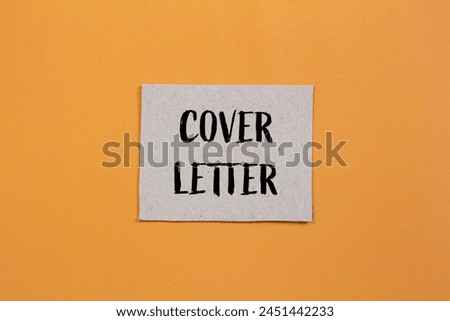 Cover letter words written on paper piece with orange background. Conceptual business symbol. Copy space.