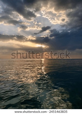 Picturesque cloudy seascape during sunset