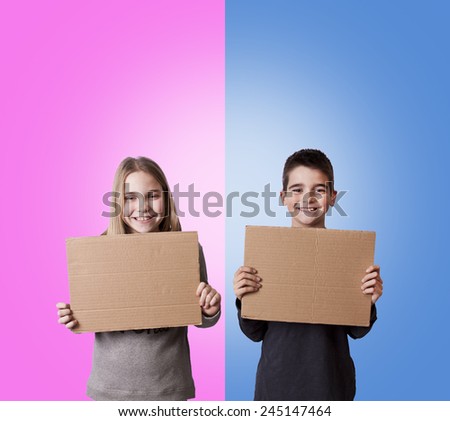 children with cardboard signs