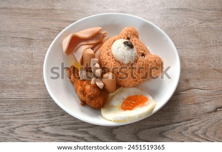 American fried rice Thai applied food decorating cute bear on plate