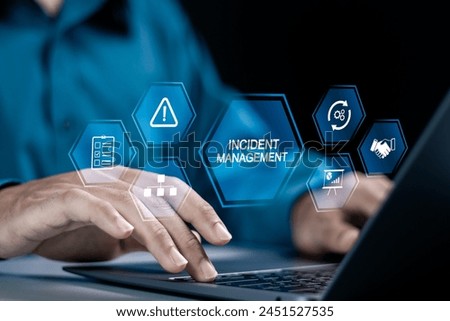Incident management process business technology concept. Businessman using laptop with incident management icon on virtual screen. diagnosing and resolving unexpected problems that occur. Royalty-Free Stock Photo #2451527535