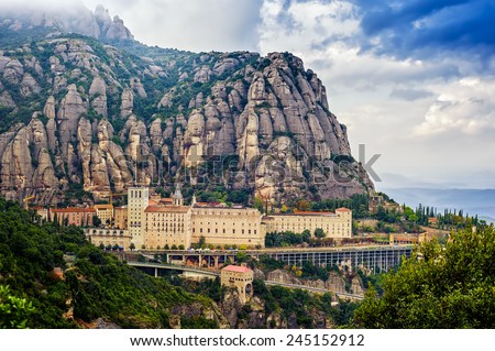 Santa Maria de Montserrat monastery. Monastery on mountain near Barcelona, in Catalonia Royalty-Free Stock Photo #245152912