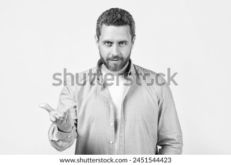 adult gesturing man with nonverbal gesture in studio. man gesturing with nonverbal gesture. man gesturing with nonverbal gesture. man gesturing with nonverbal gesture isolated on grey. Royalty-Free Stock Photo #2451544423