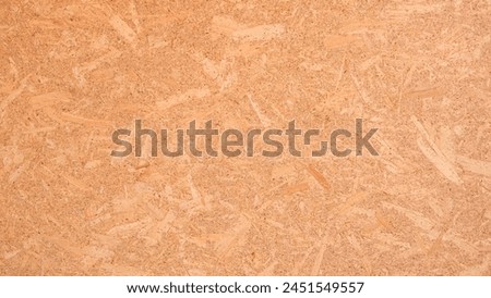 OSB oriented strand wooden board background. Seamless compressed wood particle board texture backdrop