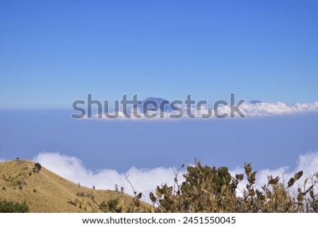 Mountains or also called banjarans and rows are a geographical area in the form of a series of several geologically related mountains or hills that form a series or stretch. Royalty-Free Stock Photo #2451550045