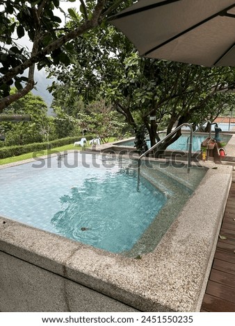 A hotel  that offers hot spring facilities for guests to relax and enjoyRefers to the bathing areas where guests can soak in the natural hot spring water.
go planning a trip to Wulai,sla ulay . Royalty-Free Stock Photo #2451550235