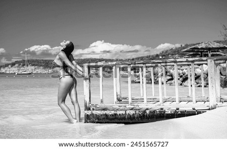 woman on summer vacation beach at holidays. photo of woman on summer vacation beach.