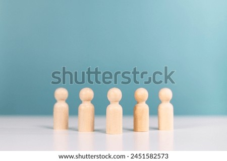 Concept of leadership, unique, group leader, team victory and teamwork. Leader standing in front of team out from the crowd