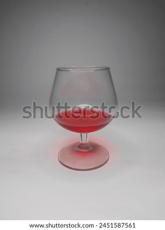 potrait of wine glass on white backvround