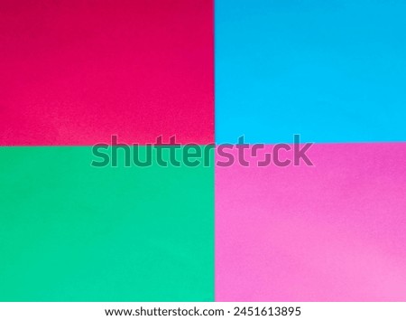 Red, light blue, green and pink pieces of cardboard, wallpaper or paper with space or place for your name, text, design, copy, paste, decor and art. Back to school concept.  Royalty-Free Stock Photo #2451613895