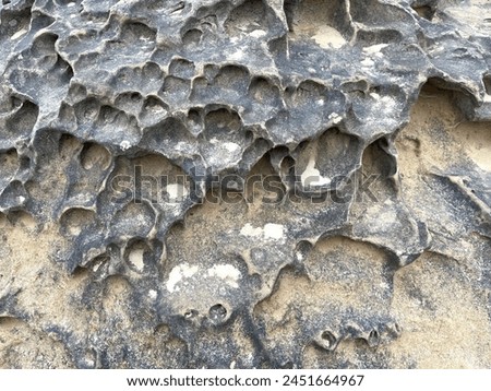 Sandstone erosion texture for background Royalty-Free Stock Photo #2451664967