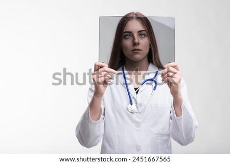 oised with the latest in transparent tech, she's at the forefront of AI-assisted diagnostics Royalty-Free Stock Photo #2451667565