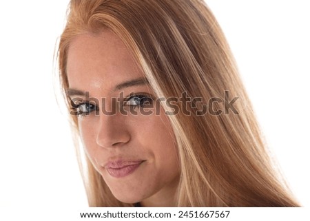 Portrait of a pensive young woman, her gaze fixed thoughtfully to the side
