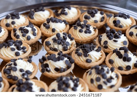 coffee break hotel during conference meeting, corporate revent with tea and coffee catering, decorated catering banquet table with variety of different pastry and bakery, with croissants and cookies Royalty-Free Stock Photo #2451671187
