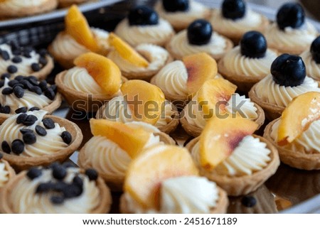 coffee break hotel during conference meeting, corporate revent with tea and coffee catering, decorated catering banquet table with variety of different pastry and bakery, with croissants and cookies Royalty-Free Stock Photo #2451671189
