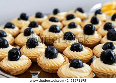 coffee break hotel during conference meeting, corporate revent with tea and coffee catering, decorated catering banquet table with variety of different pastry and bakery, with croissants and cookies Royalty-Free Stock Photo #2451671195