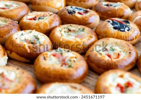 coffee break hotel during conference meeting, corporate revent with tea and coffee catering, decorated catering banquet table with variety of different pastry and bakery, with croissants and cookies Royalty-Free Stock Photo #2451671197