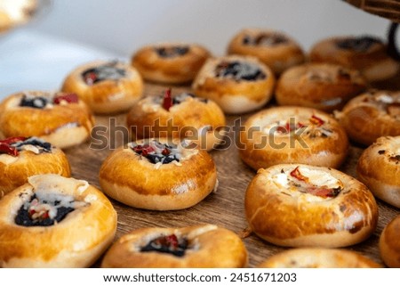 coffee break hotel during conference meeting, corporate revent with tea and coffee catering, decorated catering banquet table with variety of different pastry and bakery, with croissants and cookies Royalty-Free Stock Photo #2451671203