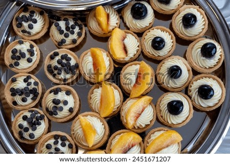 coffee break hotel during conference meeting, corporate revent with tea and coffee catering, decorated catering banquet table with variety of different pastry and bakery, with croissants and cookies Royalty-Free Stock Photo #2451671207