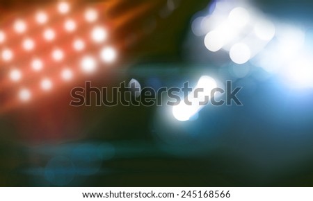 Background image with stage blurred lights and beams