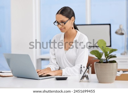 Creative, laptop and girl in office building typing, designer company and editor for agency. Woman, happy and technology for proofreading or copyediting online article in Atlanta and professional.