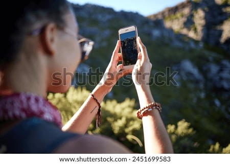 Hiking, hands and phone screen for mountain photography, nature or environment outdoor in Sweden. Mobile, display and person take picture in forest for adventure, holiday or travel on summer vacation