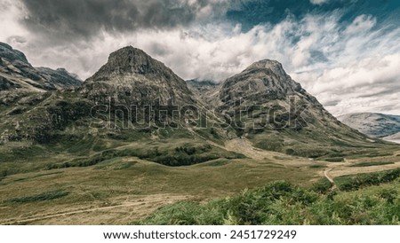 Mountains Picture with Grasses and Skys Background