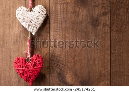 Love you. Closeup image of original composition made of decorative hearts hanging on the wall